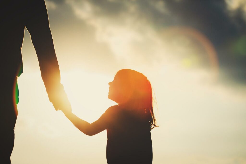 child and parent holding hands, parenting with spirit and soul ritual practice group